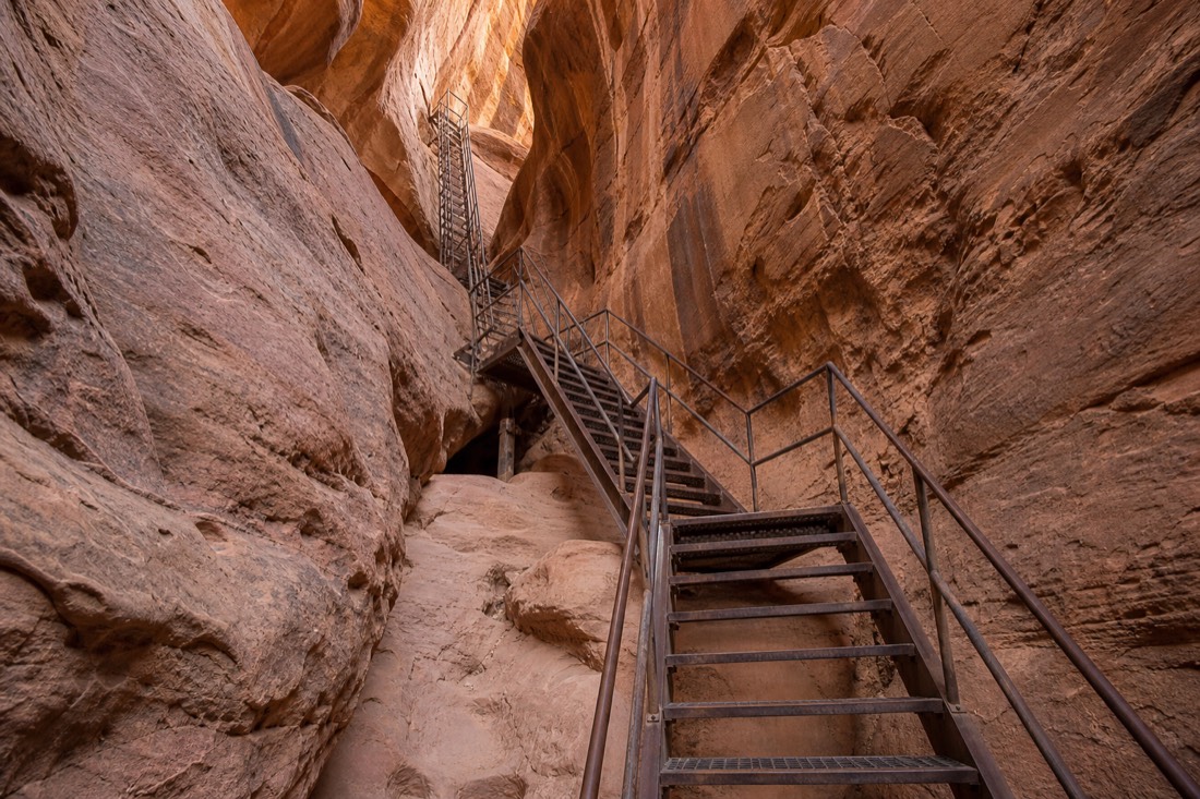 Steel stairway and exit ladder system installed inside a narrow slot canyon